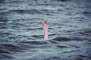 artistic rendering of drowning represents addiction
