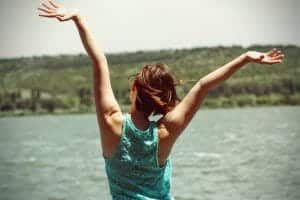 woman celebrates her 2019 drug addiction resolution