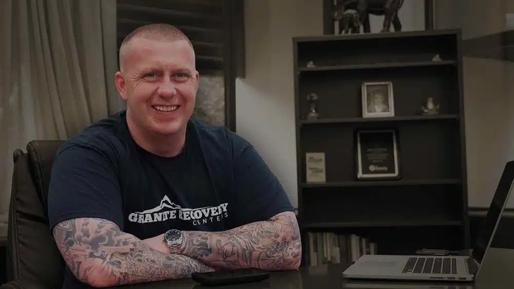 ceo at his desk at granite recovery centers