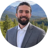 Keegan Rawlins, staff at Green Mountain Treatment Center, smiling headshot