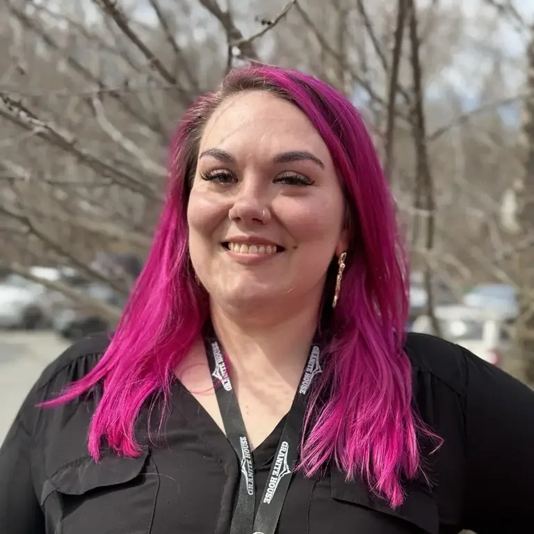 Granite Recovery Centers staff member smiling outdoors